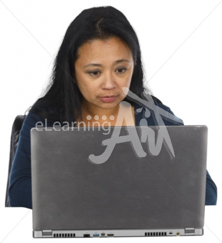 Kara typing in business casual
