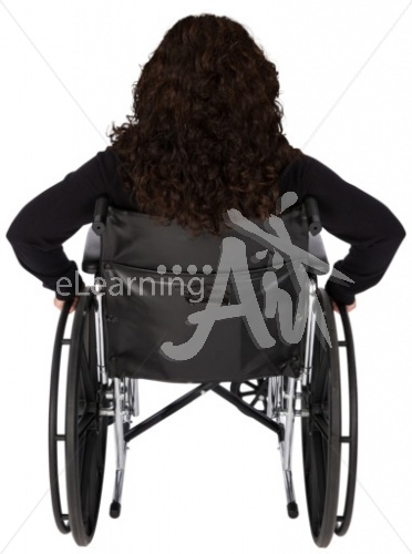 Jeanette listening in a wheelchair