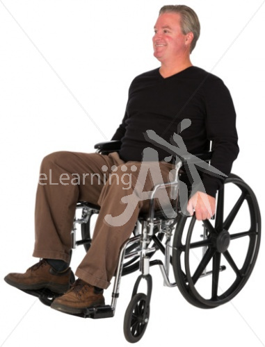 David smiling in a wheelchair