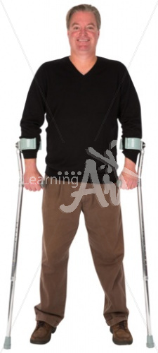 David smiling with crutches