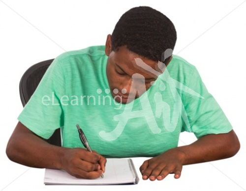 Ethan writing in casual clothes