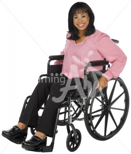 Mimi smiling in a wheelchair