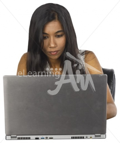 Malini typing in business casual