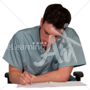 Ian writing in scrubs