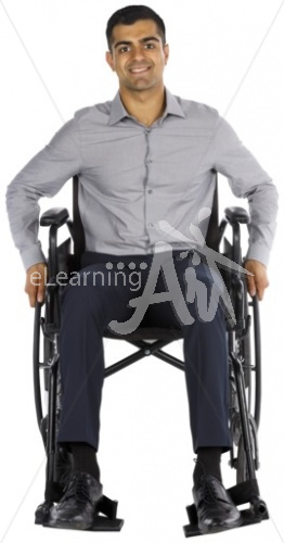 Hakim smiling in a wheelchair
