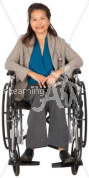 Karen smiling in a wheelchair