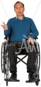 Christopher talking in a wheelchair