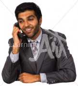 Akshay listening in a suit